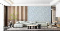 Ivory and sky blue frame a living room through this Boho Coral Soft Blue wallpaper.GD9543