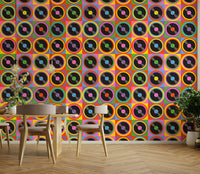 Features stylized vinyl records, possibly with abstract or pop art elements.
