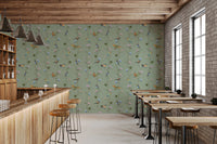 Botanical Birds in Soft Pastels Wallpaper adds gentle movement to this café-style nook