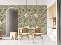 Soft green foliage layered over mauve in this scattered leaves wallpaper