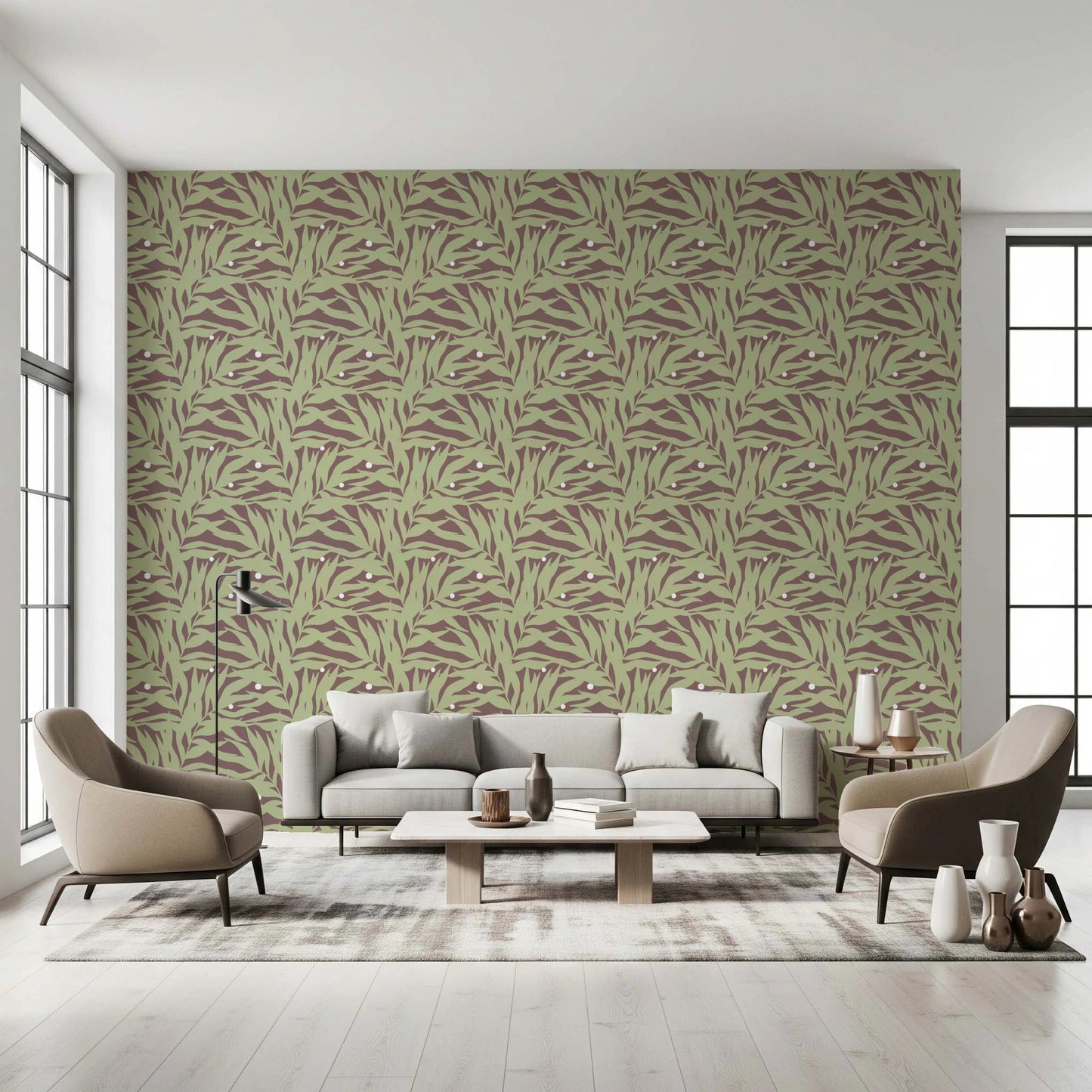 Muted botanical wallpaper showing broad leafy forms in a repeating layout