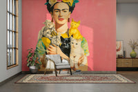 Earth-toned mural of muse and cats in garden setting

