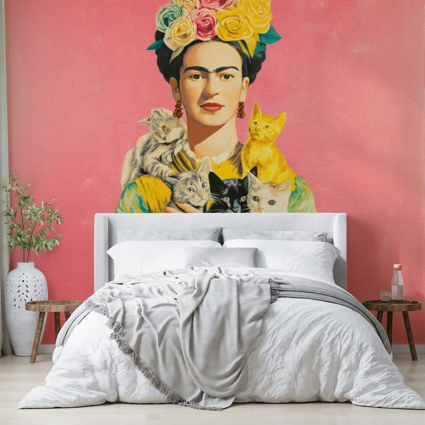 Artistic mural featuring a woman and feline companions

