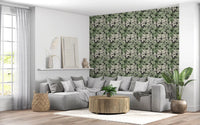 Botanical Noir Canopy Foliage Wallpaper in a light filled living room scene