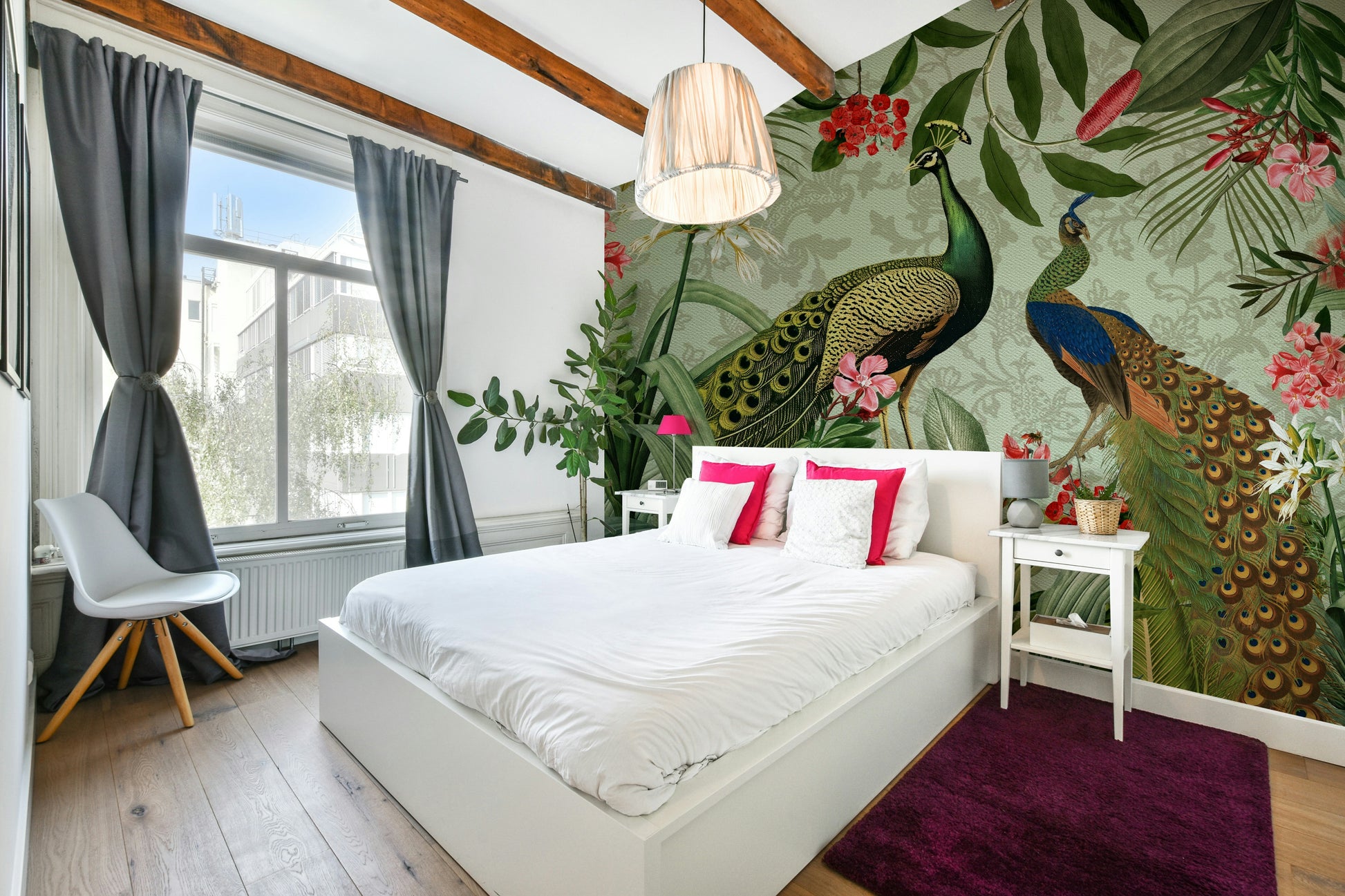 Elegant peacock mural with lush green botanical elements.

