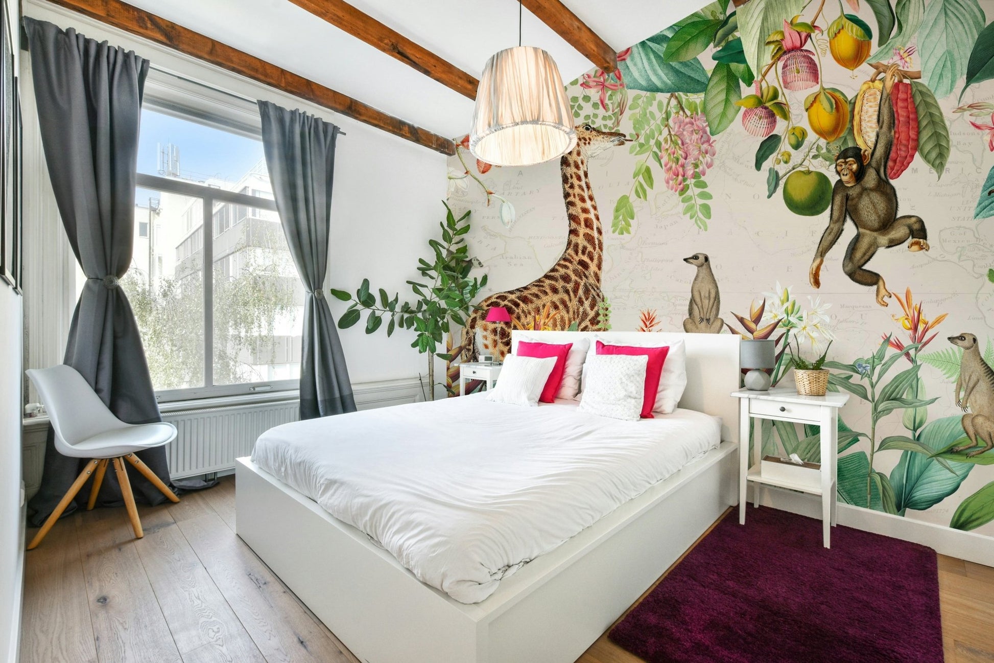 Stunning safari mural with green botanical accents

