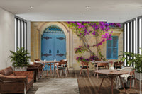 A room decorated with the Bougainvillea Door mural.

