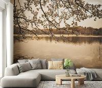 Living room sofa setup with Branches Above Lake Wall Mural and calm lake view