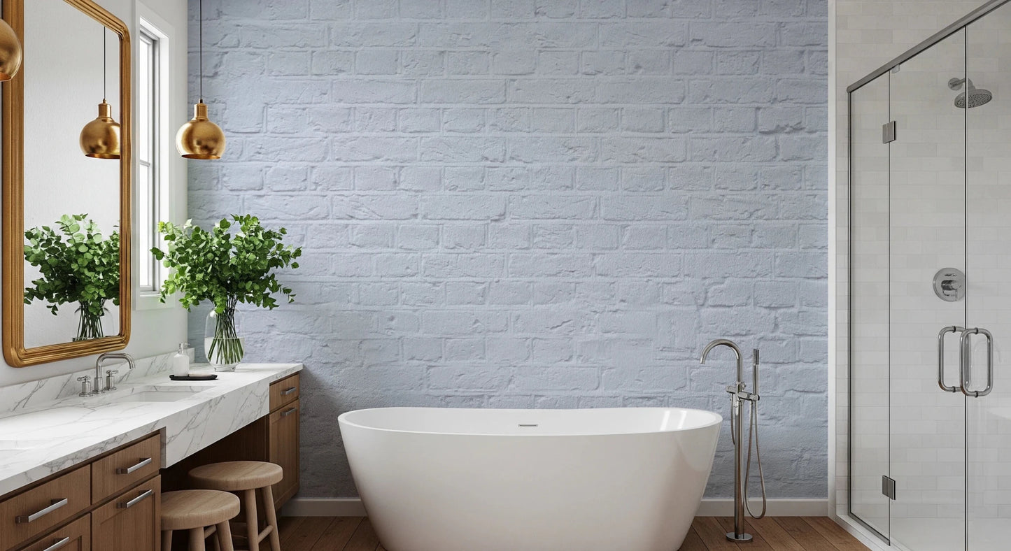Bathroom interior with Brick Decor Wall Mural behind a freestanding white bathtub