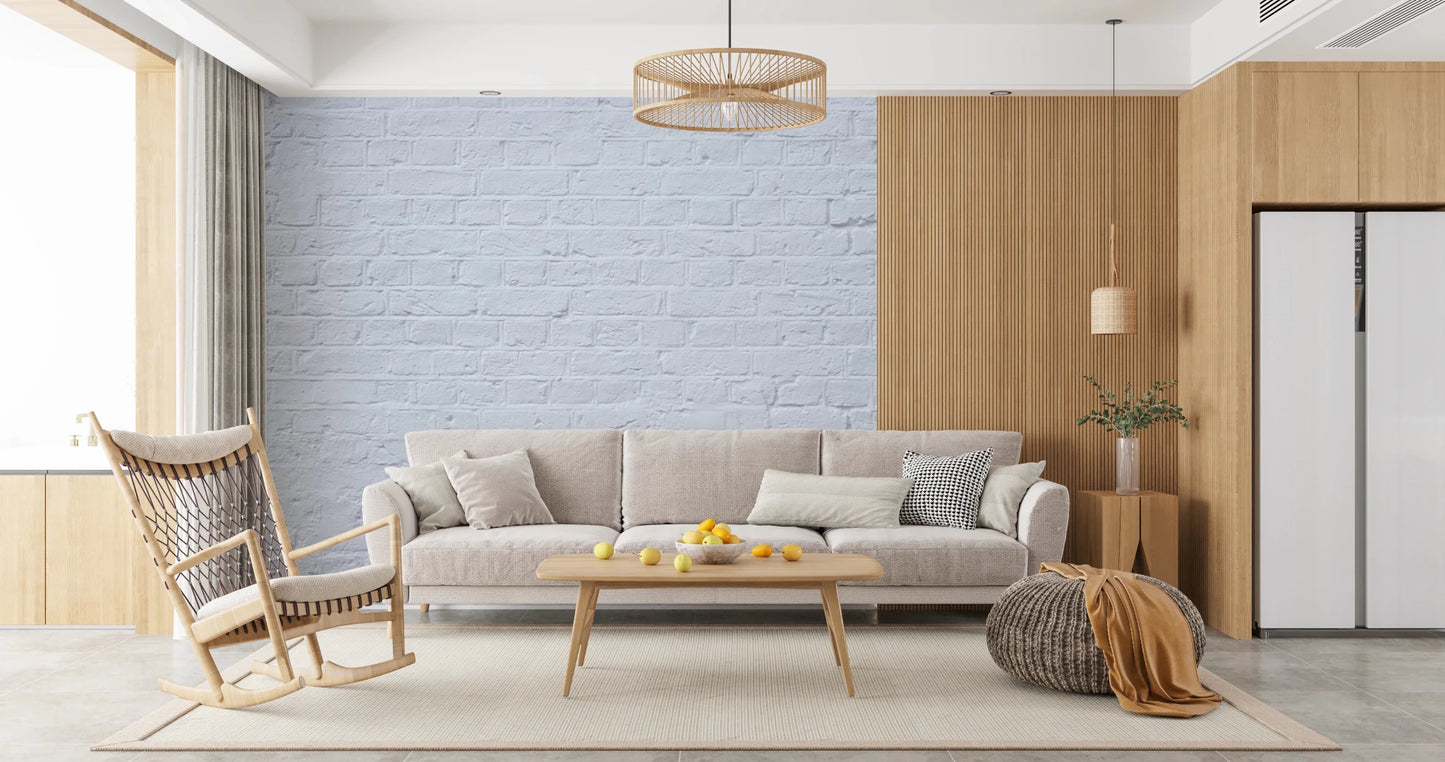 Bright lounge space with Brick Decor Wall Mural behind a low sofa and side table