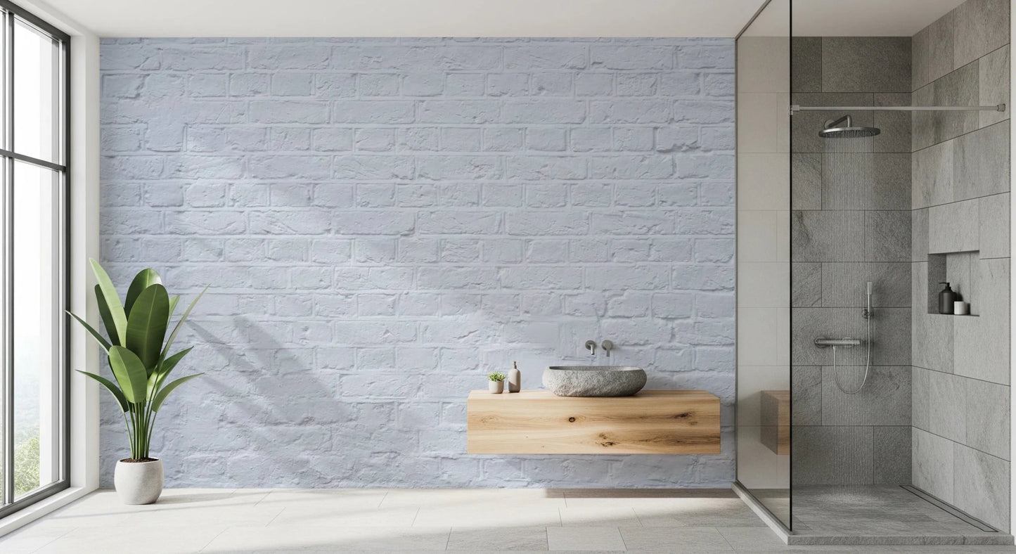 Minimal bathroom showing Brick Decor Wall Mural beside a tub and green plant