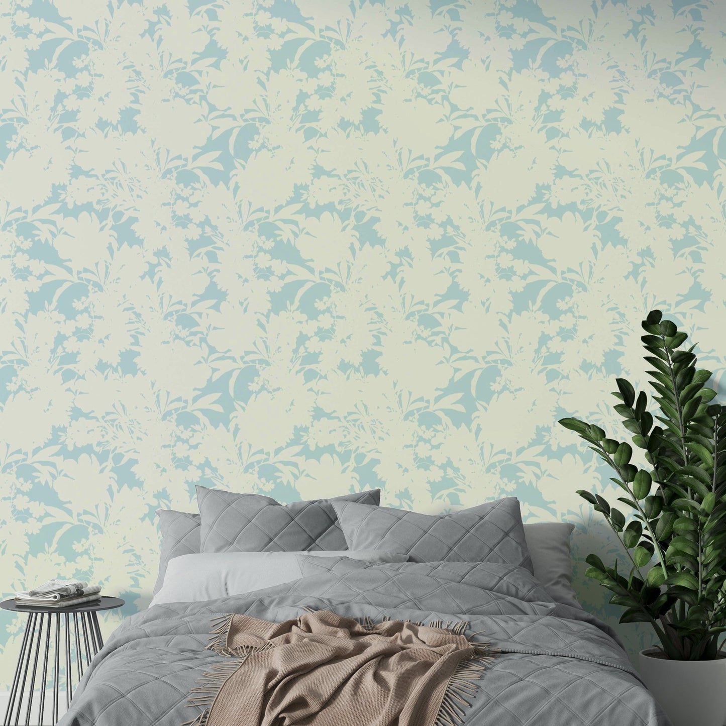 A sunroom decorated with a bright botanical mural

