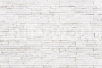 Bright Stacked Stone wallpaper in a contemporary bathroom.