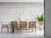 Detailed view of the realistic stacked stone mural.