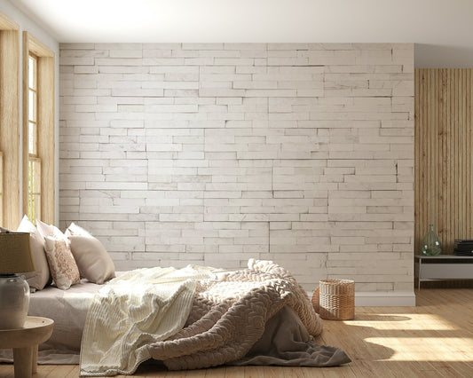 Bright Stacked Stone wall mural in a sunlit living room.