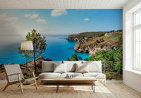 A soft lounge feels more open with Brittany Vista Wall Mural and blue bay scenery