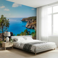 This bedroom feels fresher with Brittany Vista Wall Mural and open coastal light
