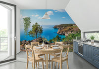 Brittany Vista Wall Mural adds a crisp sea-facing view to this kitchen dining area