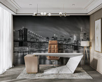 Iconic Brooklyn Bridge view at night in monochrome design

