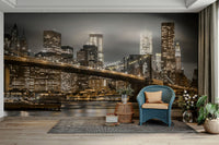 New York City skyline at night with Brooklyn Bridge

