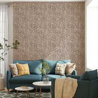 Cozy jungle-themed wallpaper design close-up

