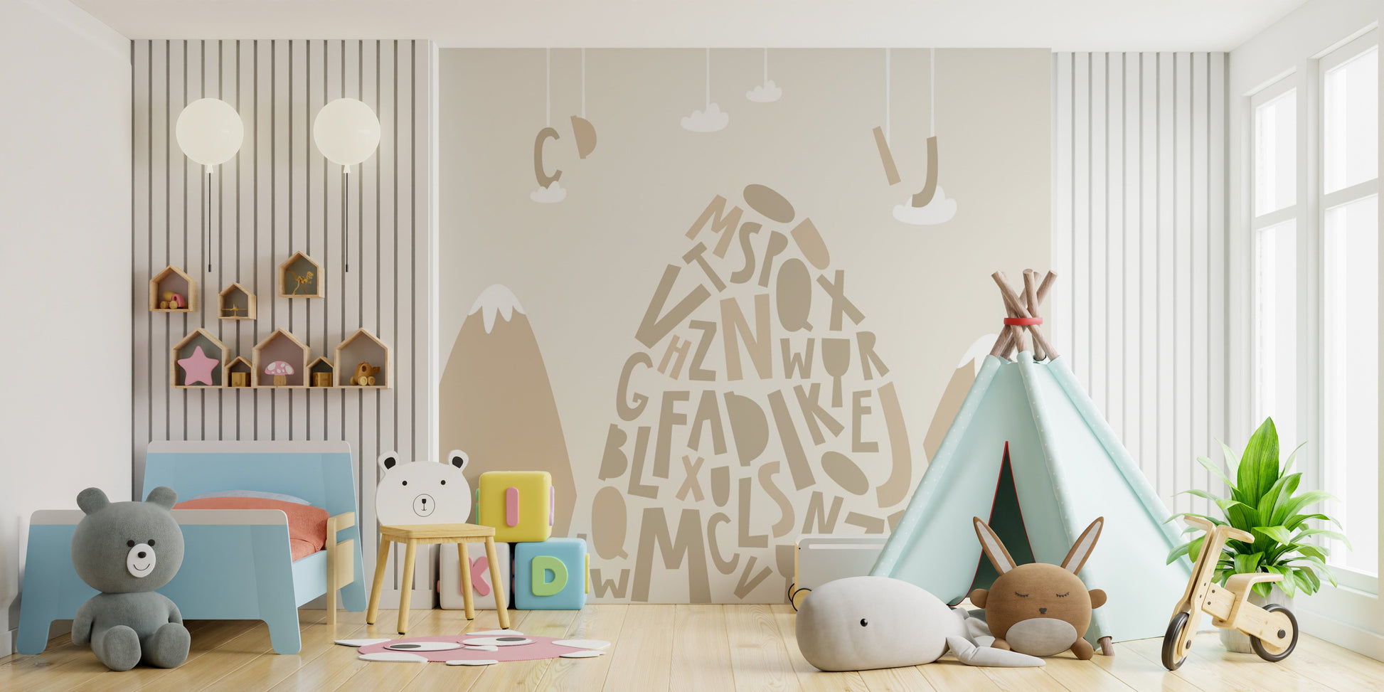 Playful mountain mural with letters
