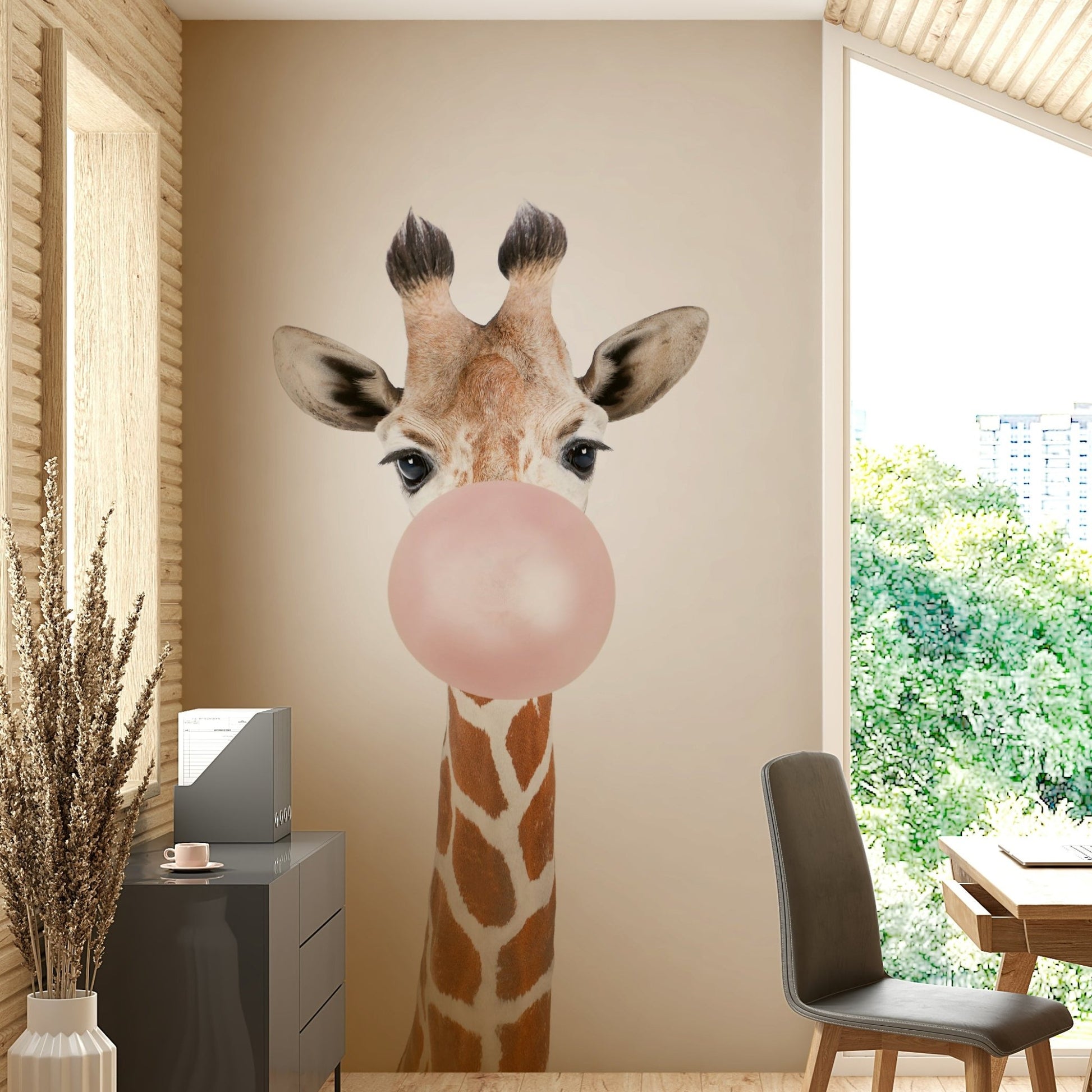 Cheerful giraffe wall mural with pink bubble gum

