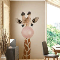 Cheerful giraffe wall mural with pink bubble gum

