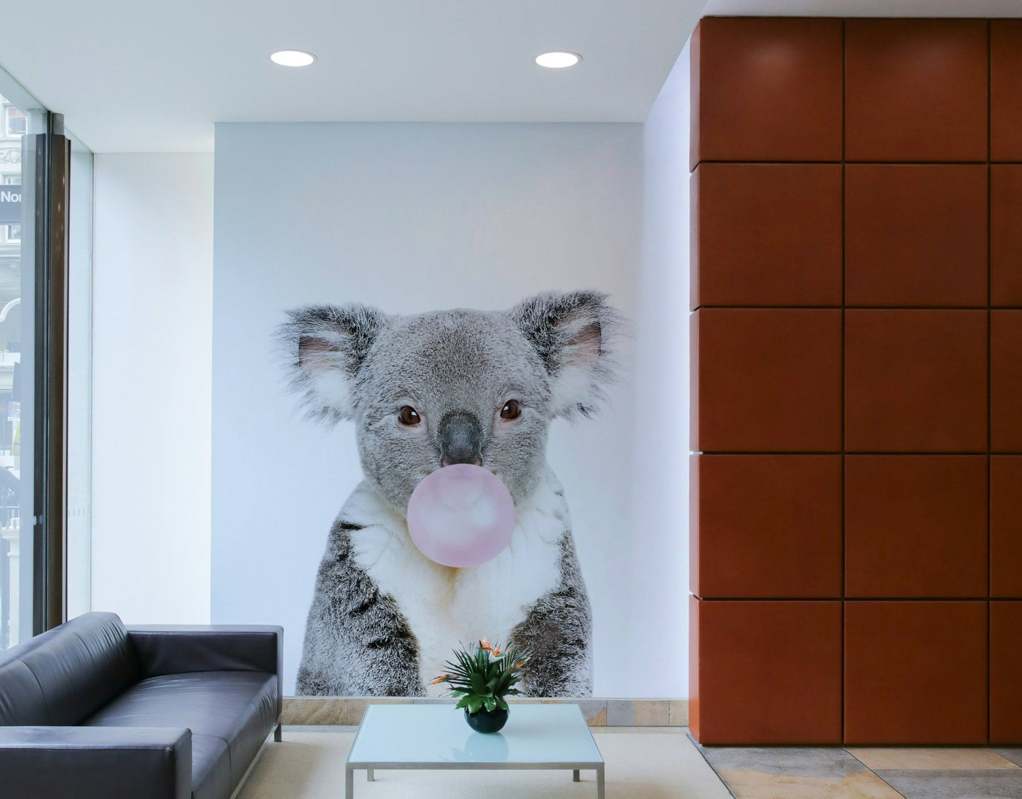 Cartoon bubble gum koala wall art for kids' bedroom.


