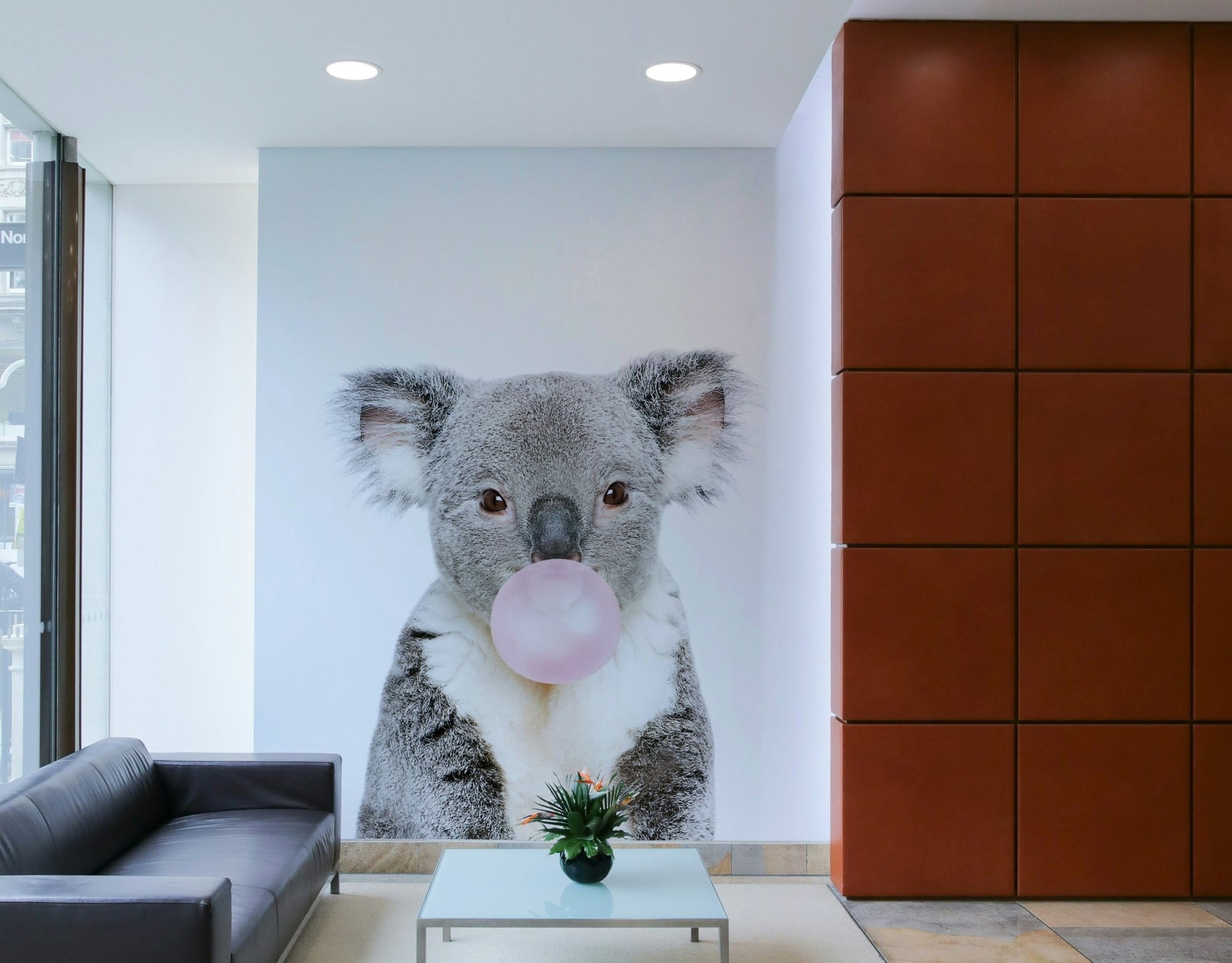 Cartoon bubble gum koala wall art for kids' bedroom.

