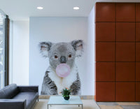 Cartoon bubble gum koala wall art for kids' bedroom.

