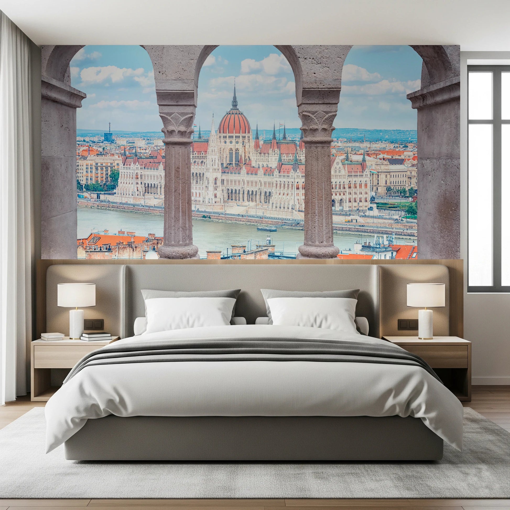 Bedroom with Budapest Vista Arches Wall Mural placed across the wall behind the bed