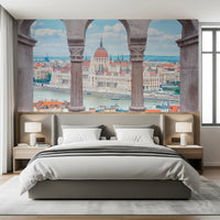 Bedroom with Budapest Vista Arches Wall Mural placed across the wall behind the bed