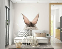 Charming bunny tail mural with soft, earthy tones


