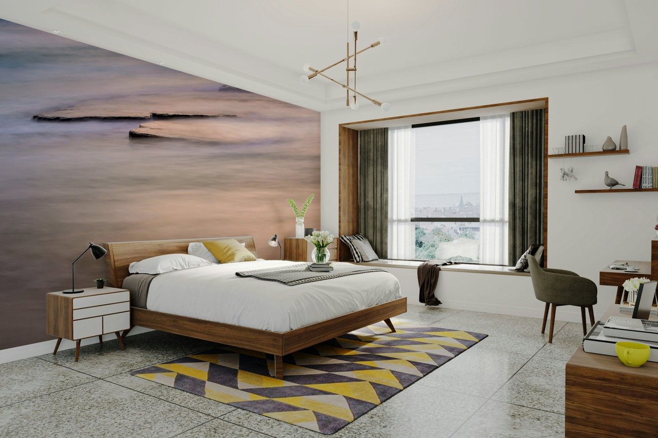 A beautiful coastal rock wallpaper mural with crashing waves.

