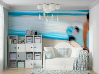 A graceful wave motion wall mural in cool, natural tones.

