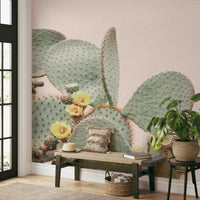 Blush-toned cactus mural with blooming wildflowers

