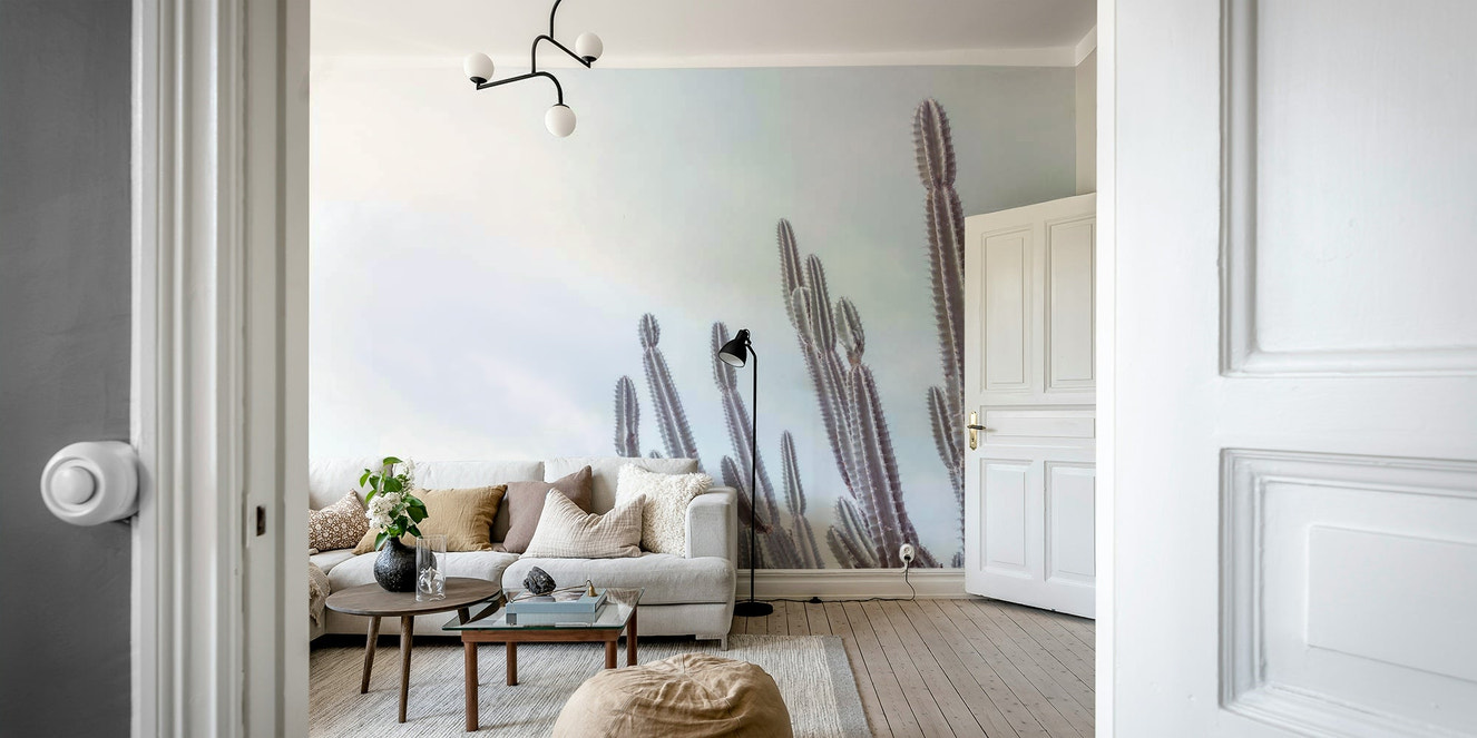A peaceful wall mural with a desert scene.


