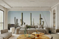 Lush green cactus plants on a serene desert backdrop.

