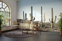 Vibrant desert scene featuring tall cactus plants.

