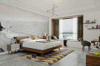 Bold black and white mural of California’s coastlines.

