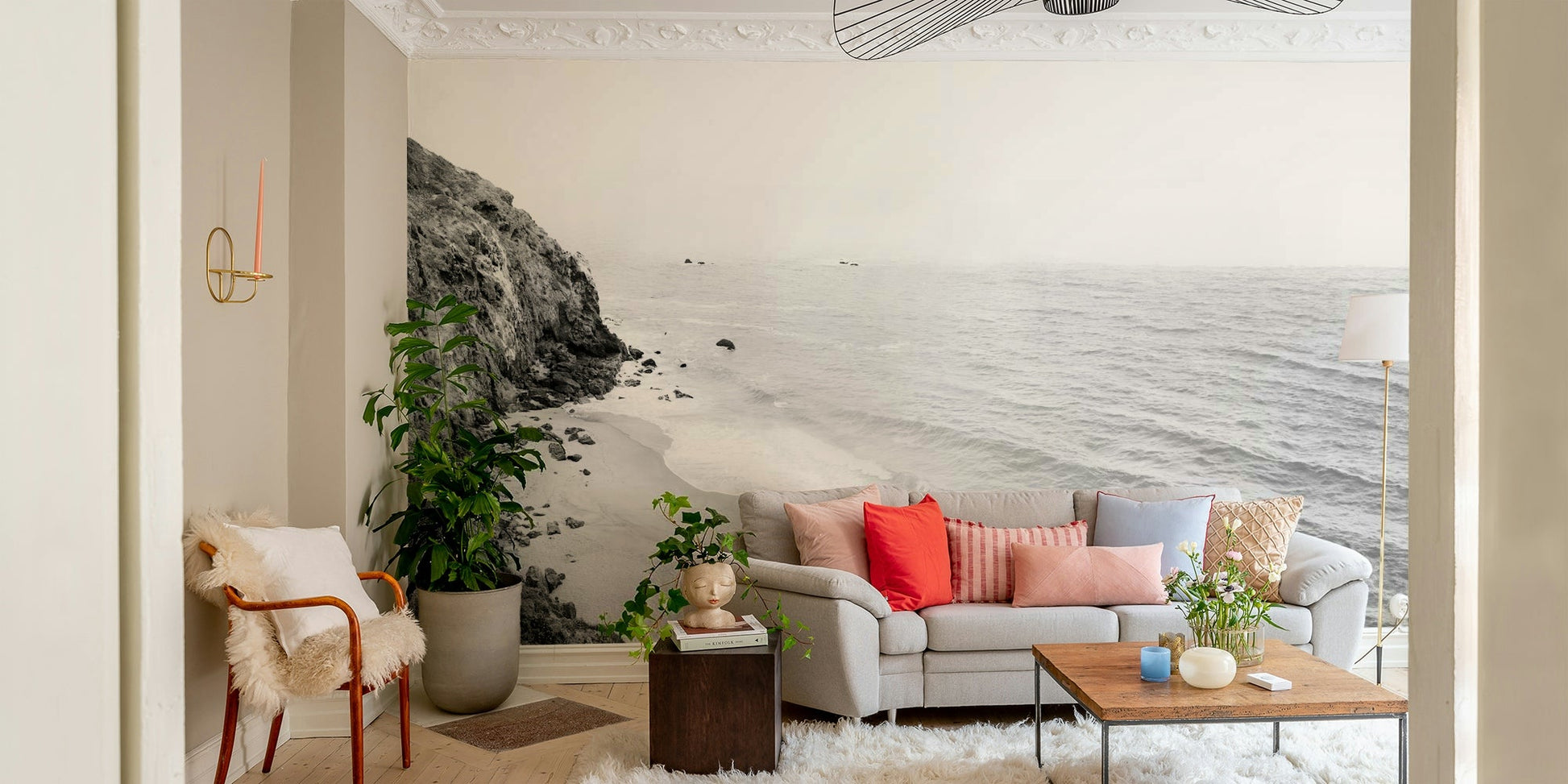Serene California coast mural with black and white tones.

