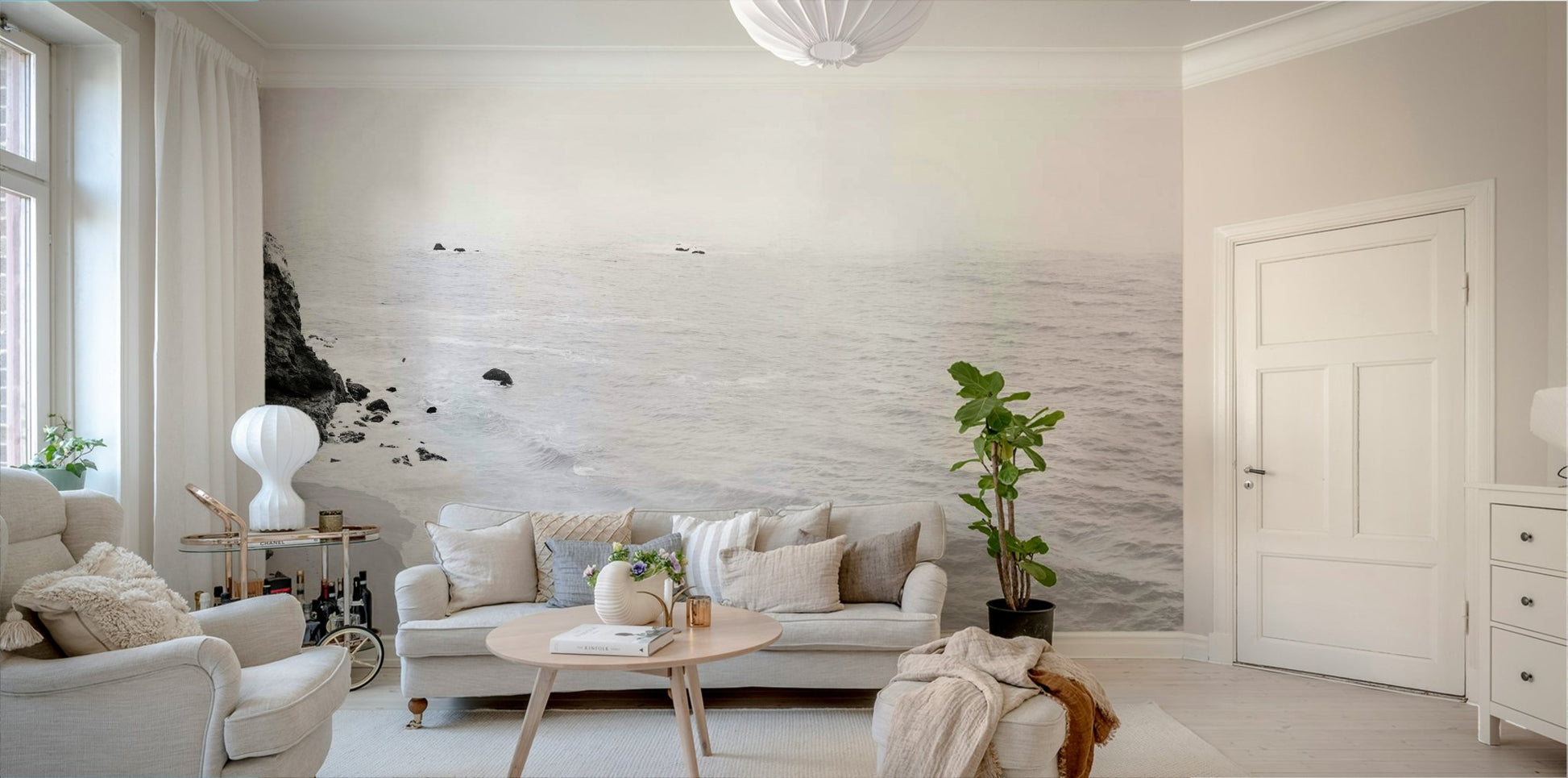 Monochrome view of California coastline with sandy beach.

