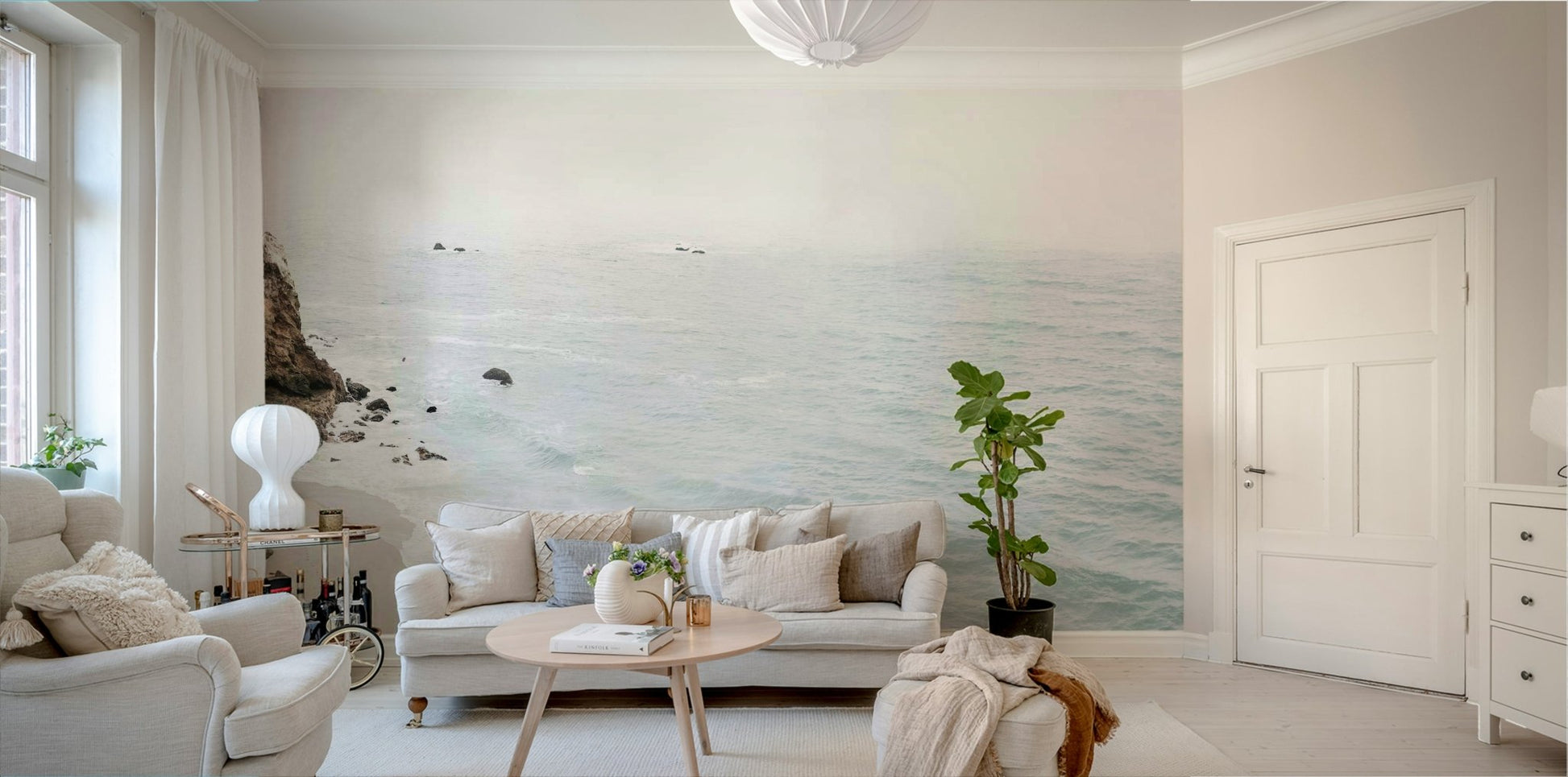 California coastal mural with vibrant blues and sandy shores.

