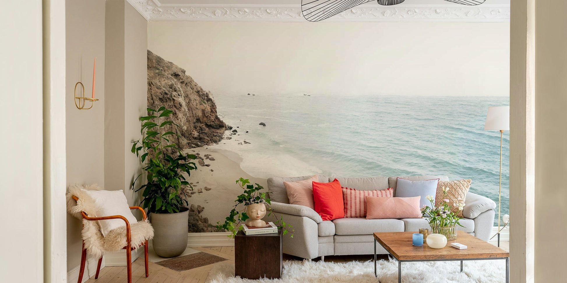 Stunning California coast wall mural with sunset hues.


