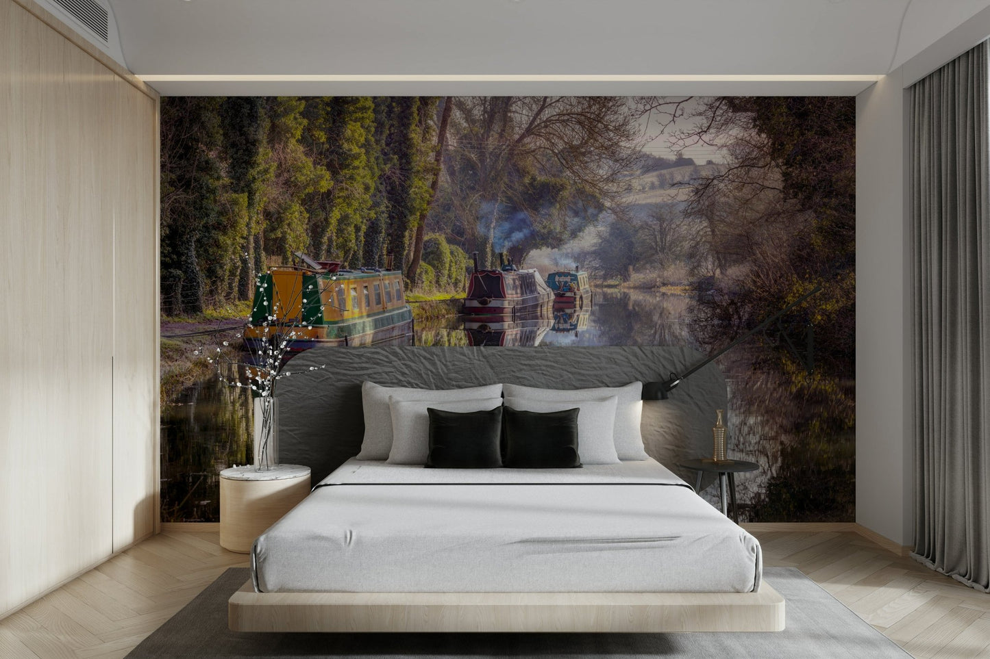 Tranquil canal scene with moored narrowboats.

