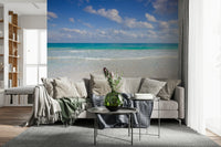Cancun Beach Wall Mural adorning a bright, airy guest room.