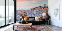 In this sitting room, Cannes Vista Wall Mural adds warm coastal color and boat detail, GD7966