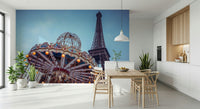 Whimsical Parisian wallpaper with a colorful fairground and iconic landmark.