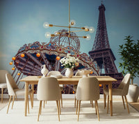 Carousel with the Eiffel Tower wall mural featuring vintage horses and iron lattice.